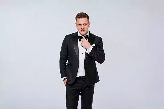 Host Vladimir Plakhtiy